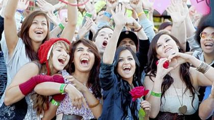"American Idol" fans react to a film crew's boom-camera during a taping preceding auditions for the television program on July 2 at the Rose Garden in Portland, Ore.