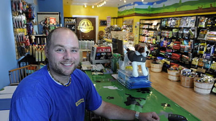 Ben Huber, one of the co-owners of a new pet food store, Petagogy, on Ellsworth Avenue in Shadyside.