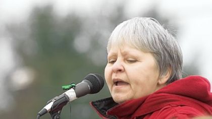 In this 2009 file photo, environmental activist Judy Bonds speaks at Robert Kennedy Jr.'s call for an end to mountaintop removal mining on Coal River Mountain at a rally outside the headquarters of the state Department of Environmental Protection in Charleston, W.Va.