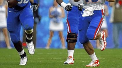 Then Florida quarterback Tim Tebow runs past the block of teammate Florida offensive lineman Marcus Gilbert as a Kentucky defensive end gives chase during a 2009 game. Gilbert is the Steelers' second round pick in the 2011 NFL Draft.