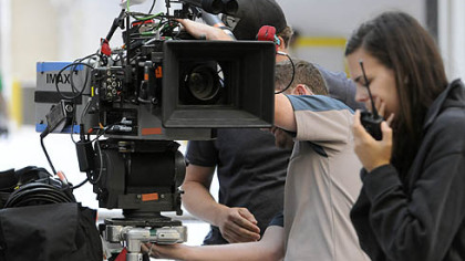The IMAX camera is prepared for a shot along Oliver Avenue as Batman films in Downtown Pittsburgh.
