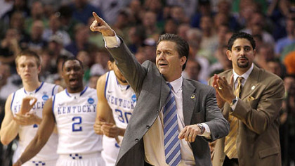 Kentucky head coach John Calipari  points during Thursday's NCAA tournament game against Princeton at St. Pete Times Forum in Tampa, Florida.
