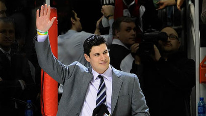 Penguins captain Sidney Crosby waves to the crowd at the team's last home regular season game in April.
