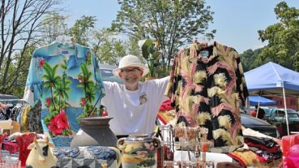 Stephen Razdik showing off his vintage Hawaiian shirts at Tour-Ed Mine Flea Market.