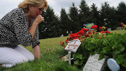 As she does every Saturday, Lucy Garrighan visits the grave of her elder son, John, who died in January at 27 of a heroin overdose.