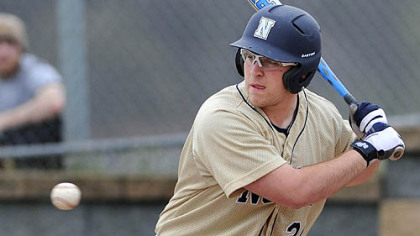 Norwin High School baseball player Rocco Amendola lets a ball pass while batting sixth as a designated hitter.