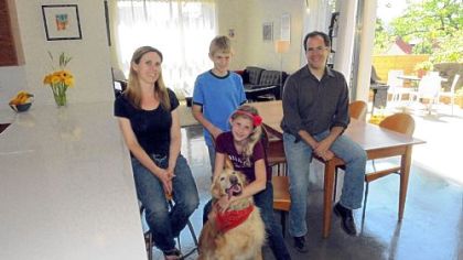 The Moss family, from left, Michelle, Griffin, 13, Luka, 11 with her dog Harley. and Andrew.
