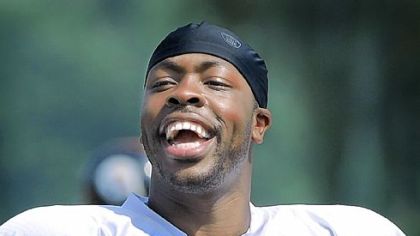 Dennis Dixon has a laugh with teammates at a training camp workout earlier this month. Dixon is in his fourth year with the Steelers after being drafted out of Oregon in the fifth round of the 2008 NFL draft.