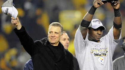 Steelers president Art Rooney II and running back Rashard Mendenhall.