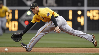 Pirates first baseman Lyle Overbay fields an RBI groundout by the Phillies' Wilson Valdez in the second inning Wednesday.