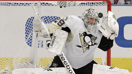 Penguins goaltender Marc-Andre Fleury stops a shot during the third period of Tuesday's game against the Rangers at Madison Square Garden in New York.