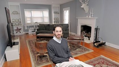Ryan Indovina in his renovated living room in his Highland Park home.
