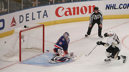 Penguins forward Dustin Jeffrey scores the winning shootout goal against Rangers goaltender Henrik Lundqvist during Tuesday's game at Madison Square Garden in New York.