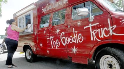 Sonya James, left, from Sheraden, visits the Goodie Truck.