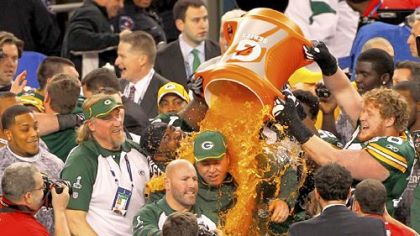 Packers coach and Greenfield native Mike McCarthy is soaked with Gatorade in the final seconds of Super Bowl XLV after defeating the Steelers Sunday in Arlington, Texas.