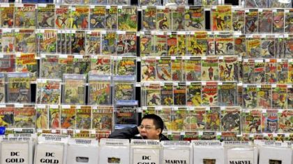 Jason Yee waits for customers at his booth at the Comicon Convention at the Monroeville Convention Center.