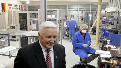 Gov. Tom Corbett toured the Kurt J. Lesker Co., a manufacturer of vacuum products in Jefferson Hills, and defended his budget decisions.