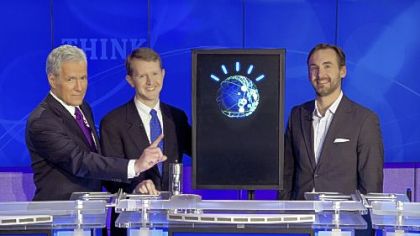 "Jeopardy!" host Alex Trebek, left, with contestants Ken Jennings, center, and Brad Rutter and an IBM computer named Watson.