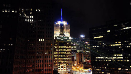 Batman symbol projected on Fifth Avenue Place, Downtown, by Lightwave International Inc., a Pittsburgh-based production company that specializes in laser light shows and special effects for movies and events.