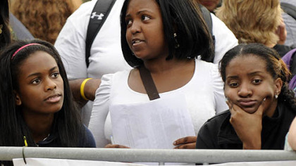 From left, Courtney Gaines of Philadelphia, Asia Woods-Smith of Swissvale and Joelle Rivers of Camden, N.J. arrived at 11:30 Tuesday night to be among the first in line.