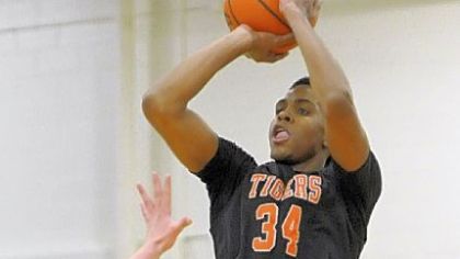 Beaver Falls' Sheldon Jeter puts up a three-point shot against Blackhawk earlier this season.