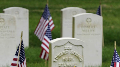 The Stars and Bars flutters at the grave of Confederate soldier Corp. T.S. Cowsert of Company I, of the 35th Mississippi Infantry in the Civil War veterans plot in Section 33 of Allegheny Cemetery in Lawrenceville.