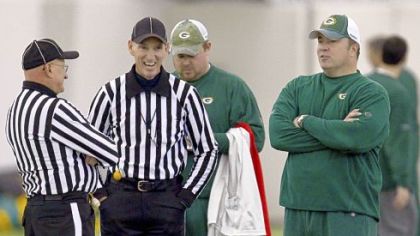 Head coach Mike McCarthy of the Green Bay Packers leads his team against the Chicago Bears Jan. 23  in the NFC championship game.