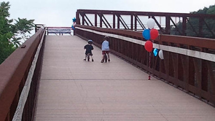 The first official users of the new trail section were Galen, 5, and Ezra Hardy, 3.