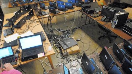 Members of VARtek, an IT management company for K-12 schools, set up 975 netbooks that will be used at the newly renovated Montour High School when it opens Sept. 9. The school will offer a wireless network throughout the building and is the first school in the district to have full wireless capability.