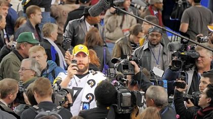 Ben Roethlisberger takes time to shoot video of the media gathered before player interviews Tuesday.