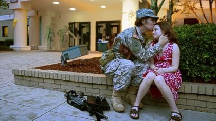 Chris Cieslak says goodbye to daughter Cara at the 412 Theater Engineer Command in Vicksburg, Mississippi.
