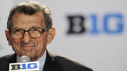 Penn State coach Joe Paterno talks to reporters during Big Ten football media day in Chicago last month.