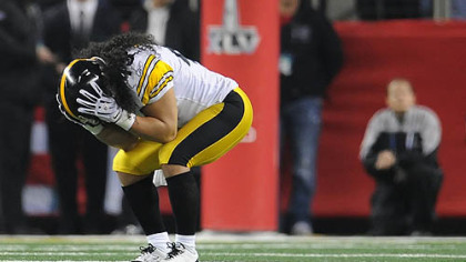 Troy Polamalu hangs his head after just missing an interception on a Aaron Rodgers pass.