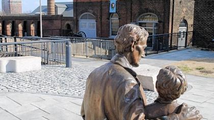 A life-size bronze statue of Abraham and Tad Lincoln at the Richmond National Battlefield Park Visitor Center depicts their visit on April 4, 1865, to tour the burned-out Confederate capital.