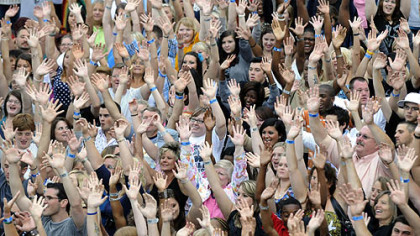 "American Idol" auditioners cheer while filming the promotional spot for the show outside of Heinz Field.