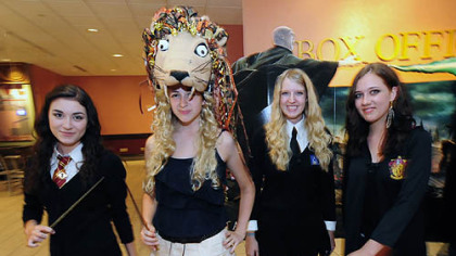 Fans arrive at AMC Loews Theater at the Waterfront for the 12:01 screening of the final Harry Potter film. From left are Nicole Lenderwood, 16, of South Park; Crystal Goettler, 17, of Brentwood; Kristin Cafaro, 17, of South Park; and Suzanne Normile, 17, of South Park.