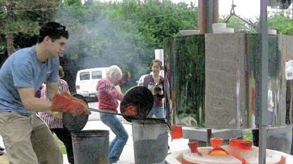 Layne Wyse, ceramics coordinator at the Pittsburgh Center for the Arts, demonstrates the pottery-making technique known as raku.