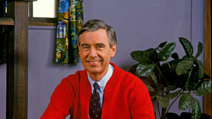 Mister Rogers in the same pose as Daniel Tiger.