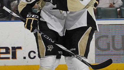 Penguins forwards Pascal Dupuis (left) Maxime Talbot.