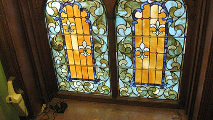 Detail of bottom panels of stained glass in the landing of the Wigman House in Carrick.