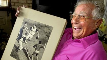 James Klingensmith on July 4, 2001, his 90th birthday, with his famous photo of Bill Mazeroski rounding the bases at the World Series.