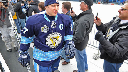 Penguins captain Sidney Crosby makes his way to the ice at Heinz Field Friday.
