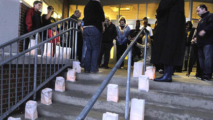 About 30 people gathered at Sunnyside Public school in Stanton Heights to mark the second anniversary of the shooting deaths of Pittsburgh police Officers Paul J. Sciullo II, Stephen Mayhle and Eric G. Kelly, who were killed by a gunman in Stanton Heights on April 4, 2009.