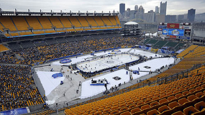 The Penguins practice on the ice Friday at Heinz Field.