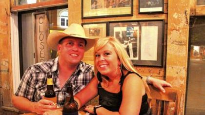 Toby and Amanda O'Jibway enjoy a beer in Gruene Hall.