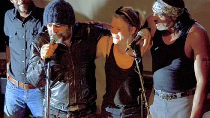 Music producer Daniel Lanois, second from left, gets his chance to shine on stage with Black Dub -- Brian Blade, left, Trixie Whitley and Daryl Johnson.