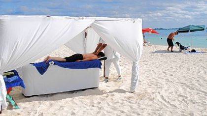 Swimming and snorkeling aren't the only activities for visitors on the sugar-white sands of Isla Mujeres, Mexico. It's also possible to get a massage right on the beach.