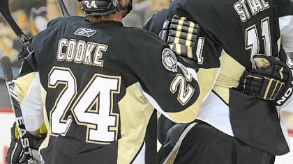 Jordan Staal, right, celebrates with linemate Matt Cooke after scoring a first-period goal Tuesday against the Detroit Red WIngs at Consol Energy Center.