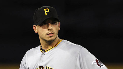 Charlie Morton, seen pitching Sunday in Denver, is off to a 3-1 start with a 3.52 ERA.