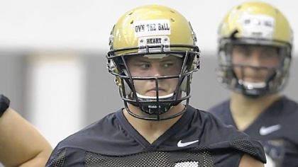 Chris Jacobson: Coaches would prefer that he play offensive guard.